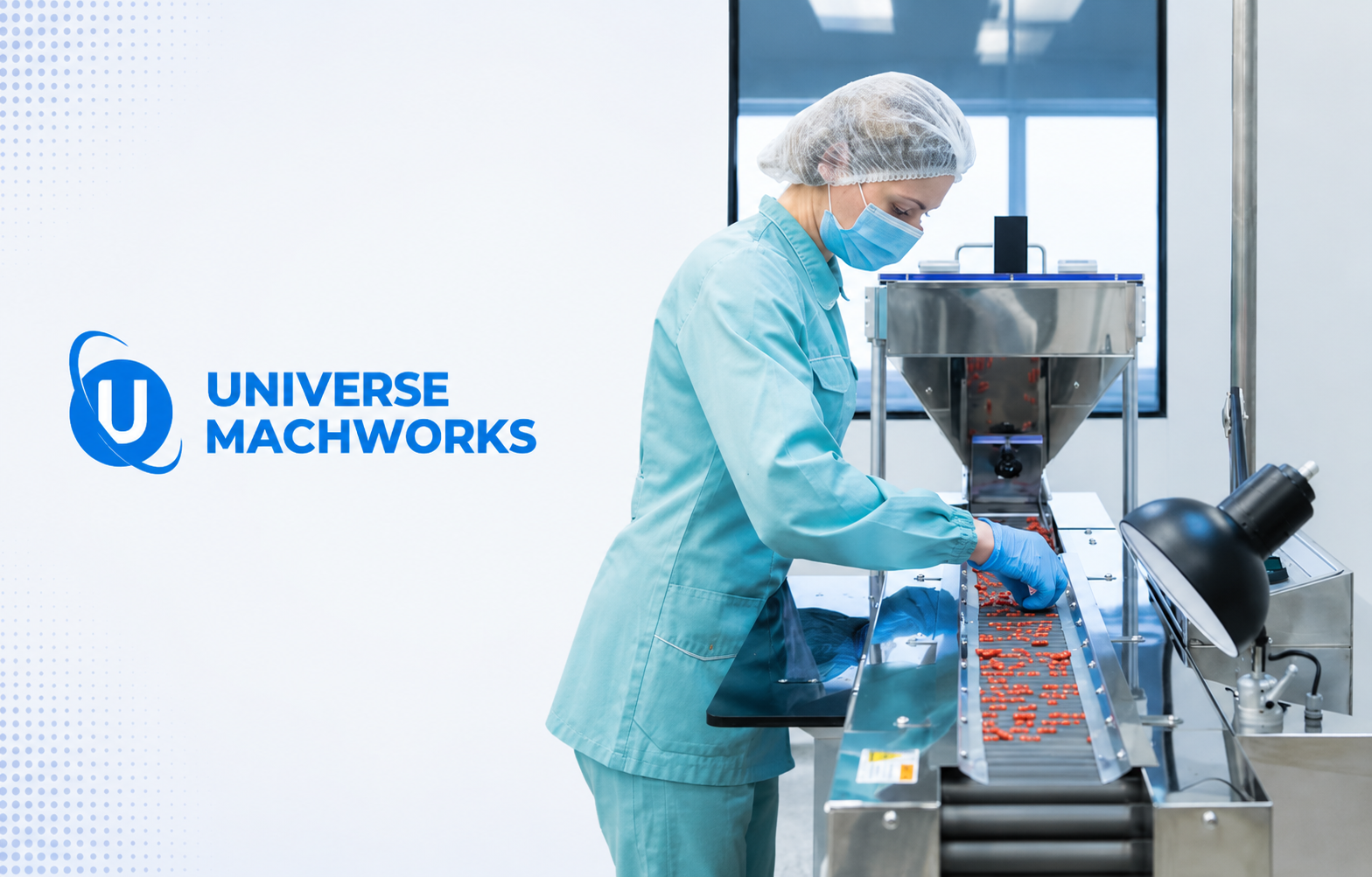 Pharmaceutical operator in cleanroom uniform inspecting capsules on a stainless steel capsule filling machine